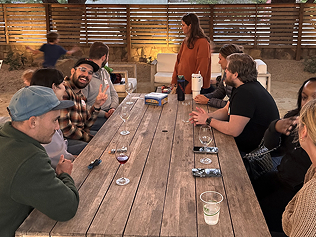 A photo of a Constructable team outing at a backyard wine bar